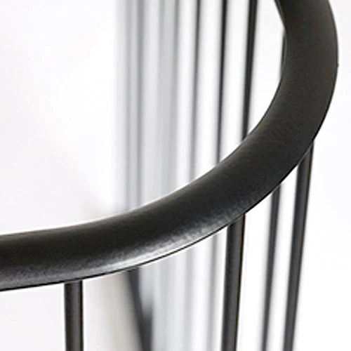 Contemporary-Fireguard-Rail-01 Close-up of the convex solid steel top rail in painted black