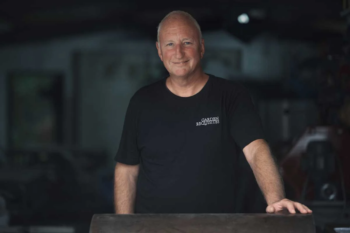 A portrait of Garden Requisites founder John Thurman in the workshop