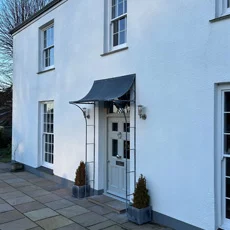 ironwork porch over front door