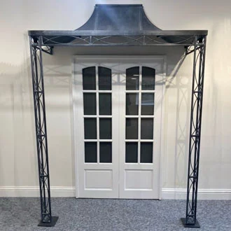 Front view of a Georgian style zinc metal door canopy with two supporting columns