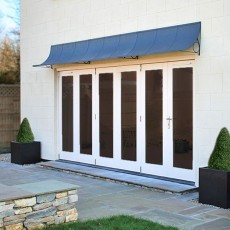 Door canopy over bifold doors in grey