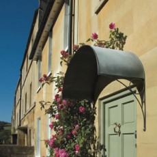 Ellipse arched door canopy